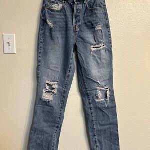 Distressed Blue Denim Jeans